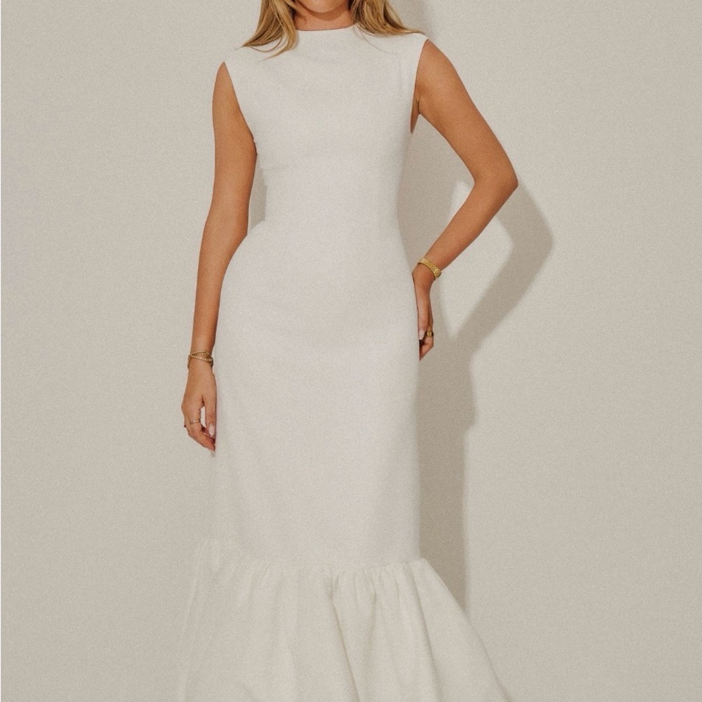 The Ultimate Muse Sleeveless Peplum Hem Midi Dress